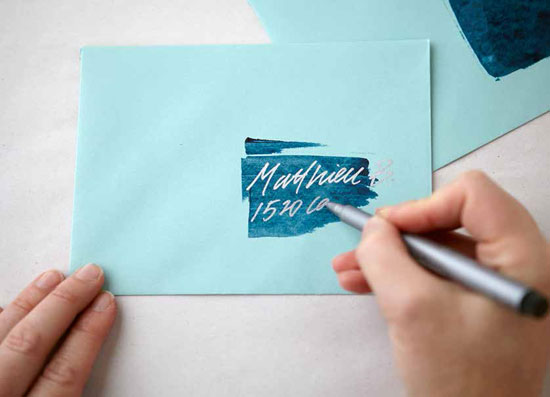 If using dark paint, address envelopes with a metallic or neon pen.